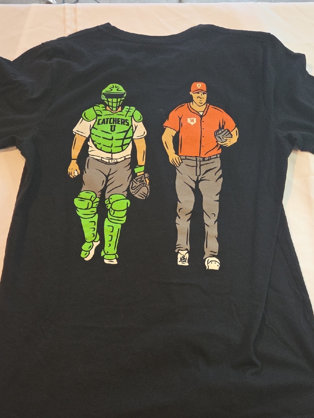 Source Unknown Black Tee with Neon Green Catcher and Orange Coach Graphic